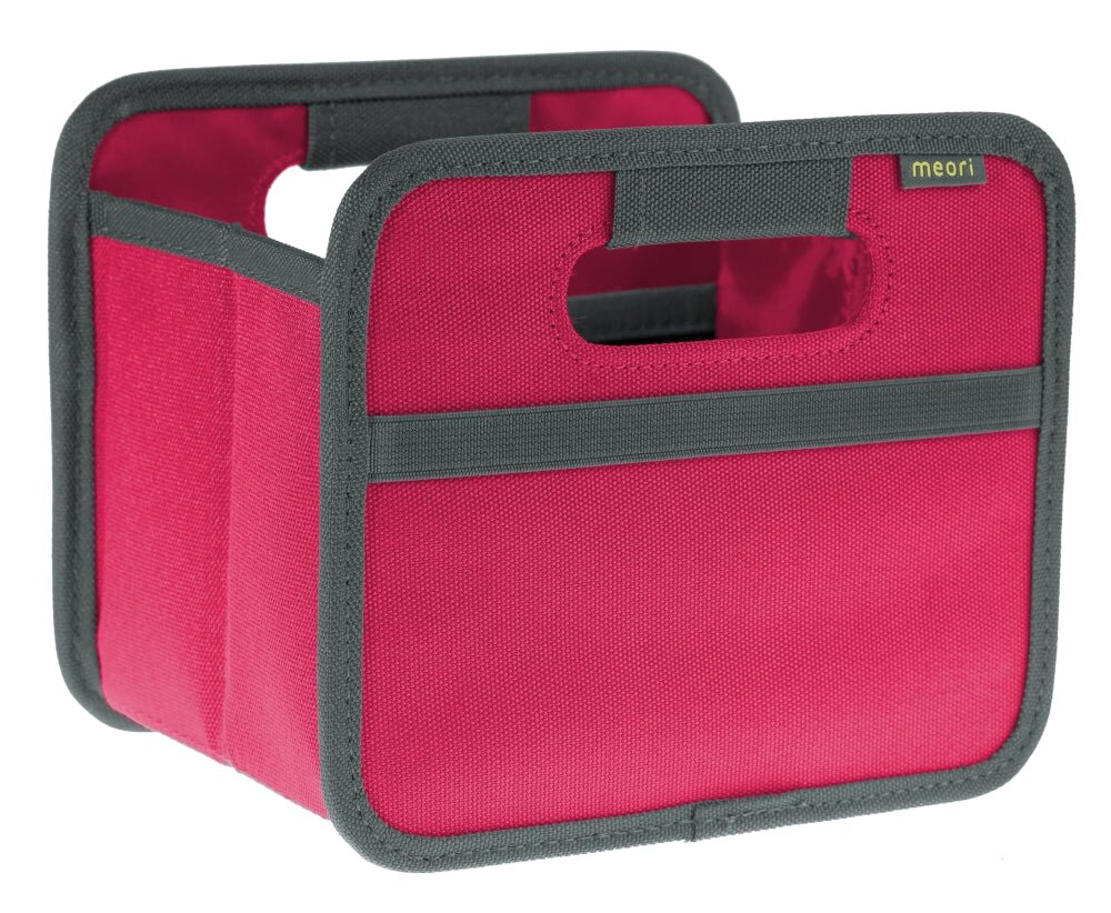 Faltbox meori Mini in Berry Pink mit grauen Kanten, Vorderseite mit Griffausschnitt und kleinem meori-Label oben rechts