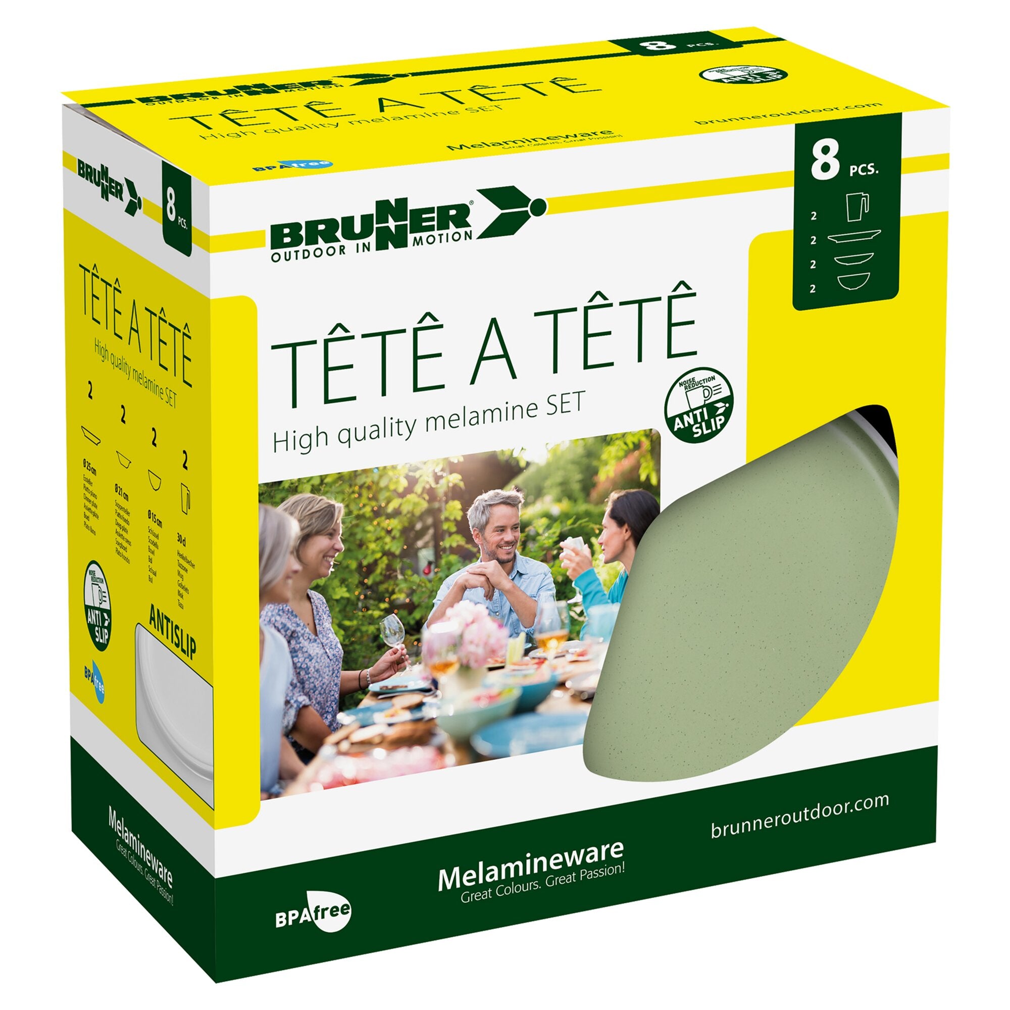 Gelb-grüne Verpackung eines achtteiligen Melamin-Geschirrsets Tête-à-Tête Dolomit grün, Vorderseite zeigt Outdoor-Szene mit Tischrunde