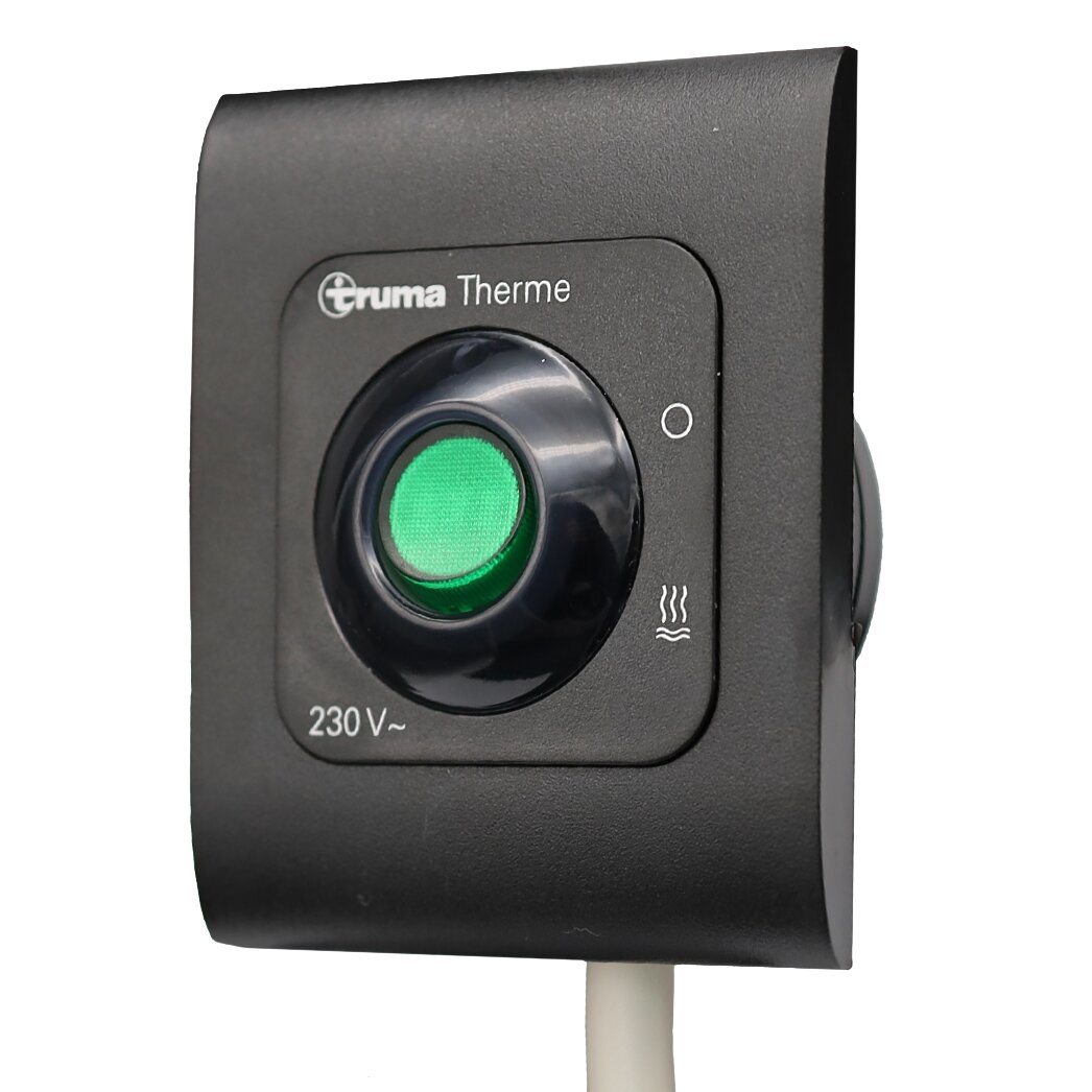 Schwarzes quadratisches Bedienteil mit grünem kreisrundem Startknopf, 230 V~, Wärmesymbol rechts, Kabel unten, Gruma Therme sichtbar