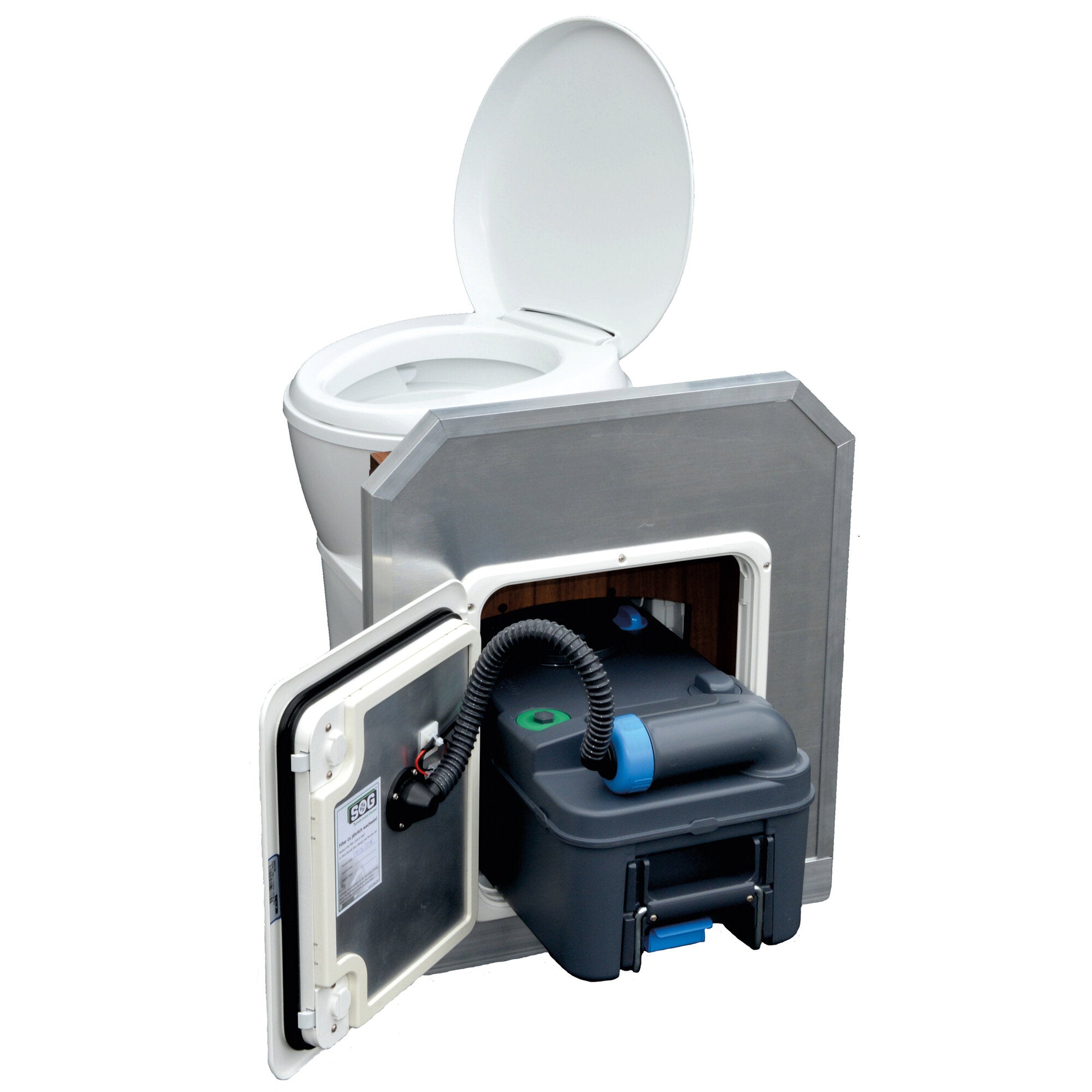 Weißer Toilettensitz mit offenem Deckel; hinter einer Metallfront sichtbar eine elektrische WC-Entlüftungseinheit, Schlauch, Motor und Kabeln