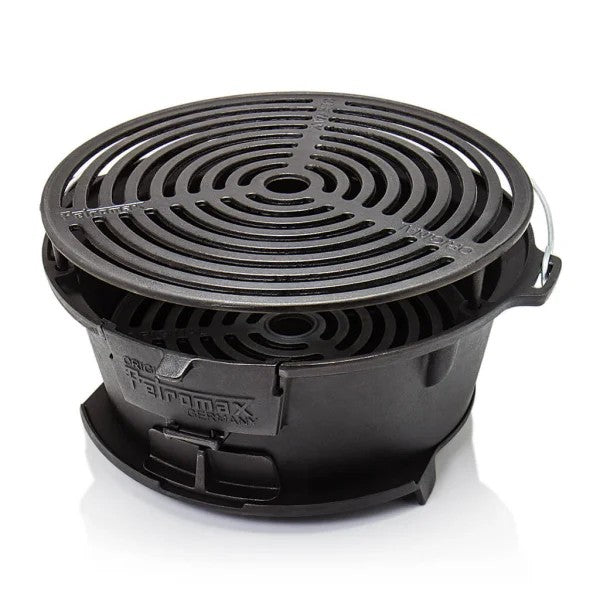 Schwarzer Petromax Feuergrill aus Gusseisen mit runden Grillrost und Griffen, kompakt und robust für Outdoor-Camping-Einsatz.