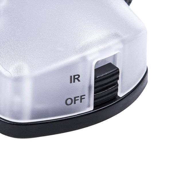 Kompaktes taktisches Helmlicht mit transparentem Gehäuse, sichtbarem schwarzen Schiebeschalter mit Markierungen "IR" und.