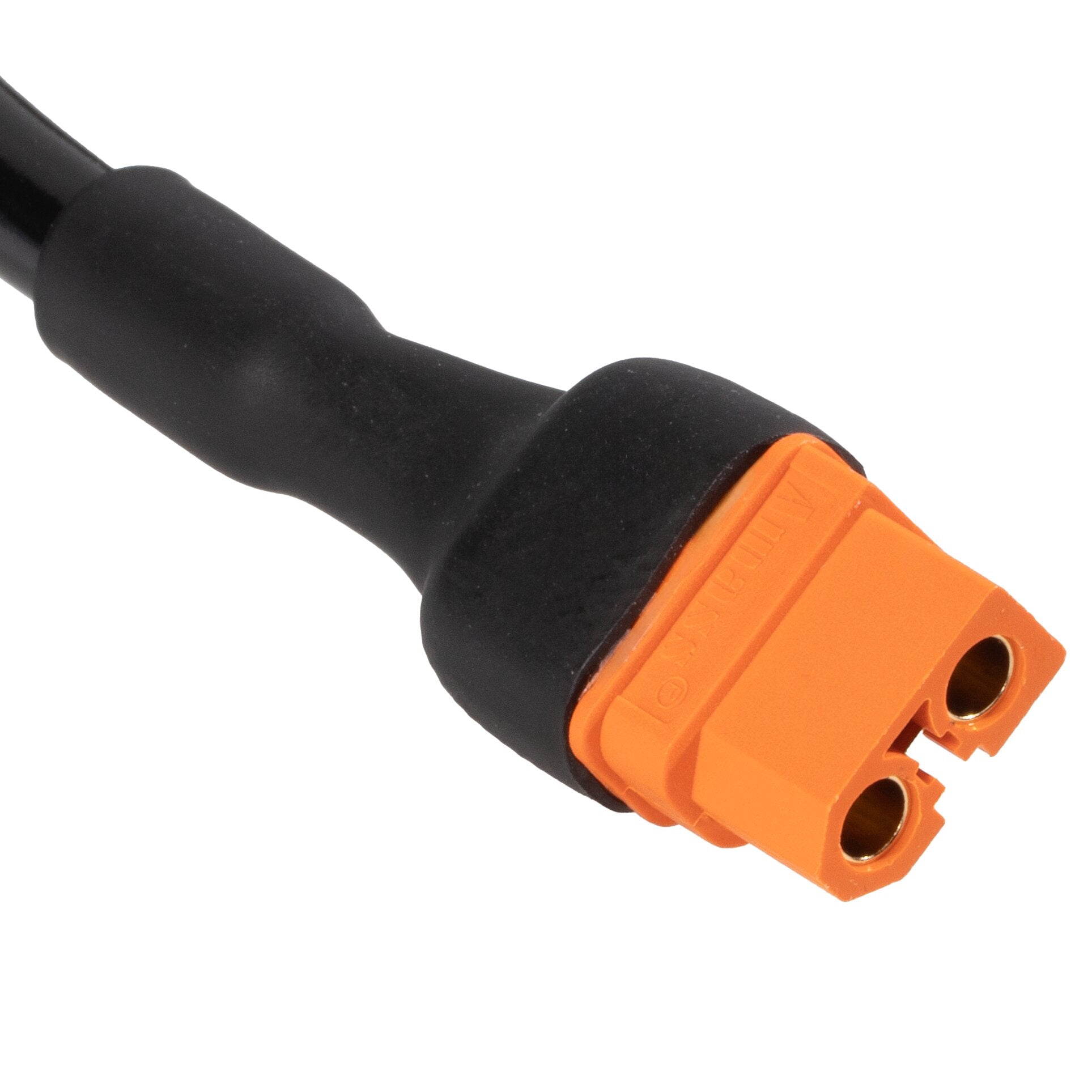Nahaufnahme der SureSeal-Buchse auf XT60i-F-Adapter: schwarzes Kabelgehäuse trifft auf orangefarbenes Steckteil, runde Metallkontakte sichtbar