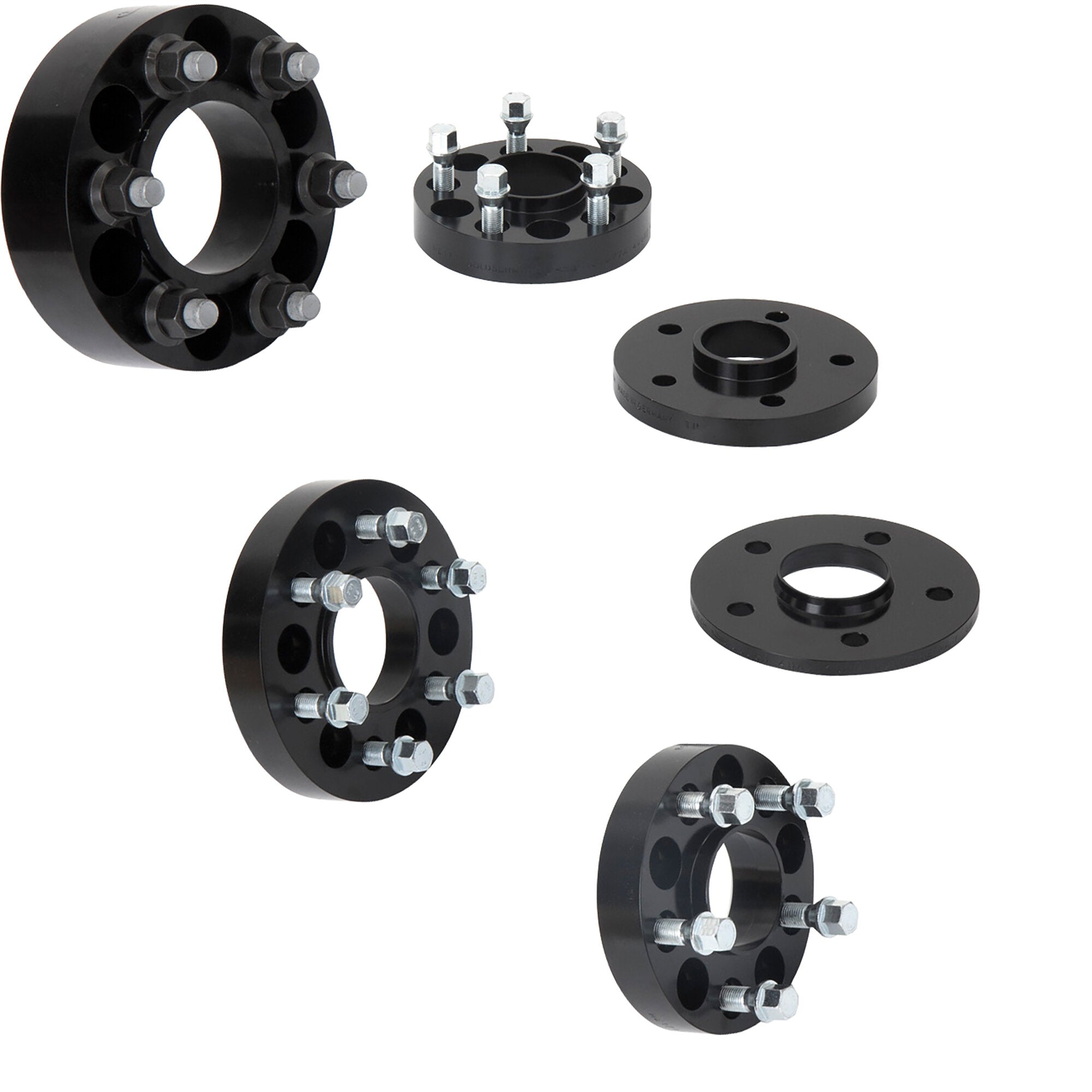 Schwarzes mehrteiliges Spurverbreiterungssystem aus Metall mit Bolzen, Muttern und Distanzringen; mehrere Scheiben und Montageplatten sichtbar