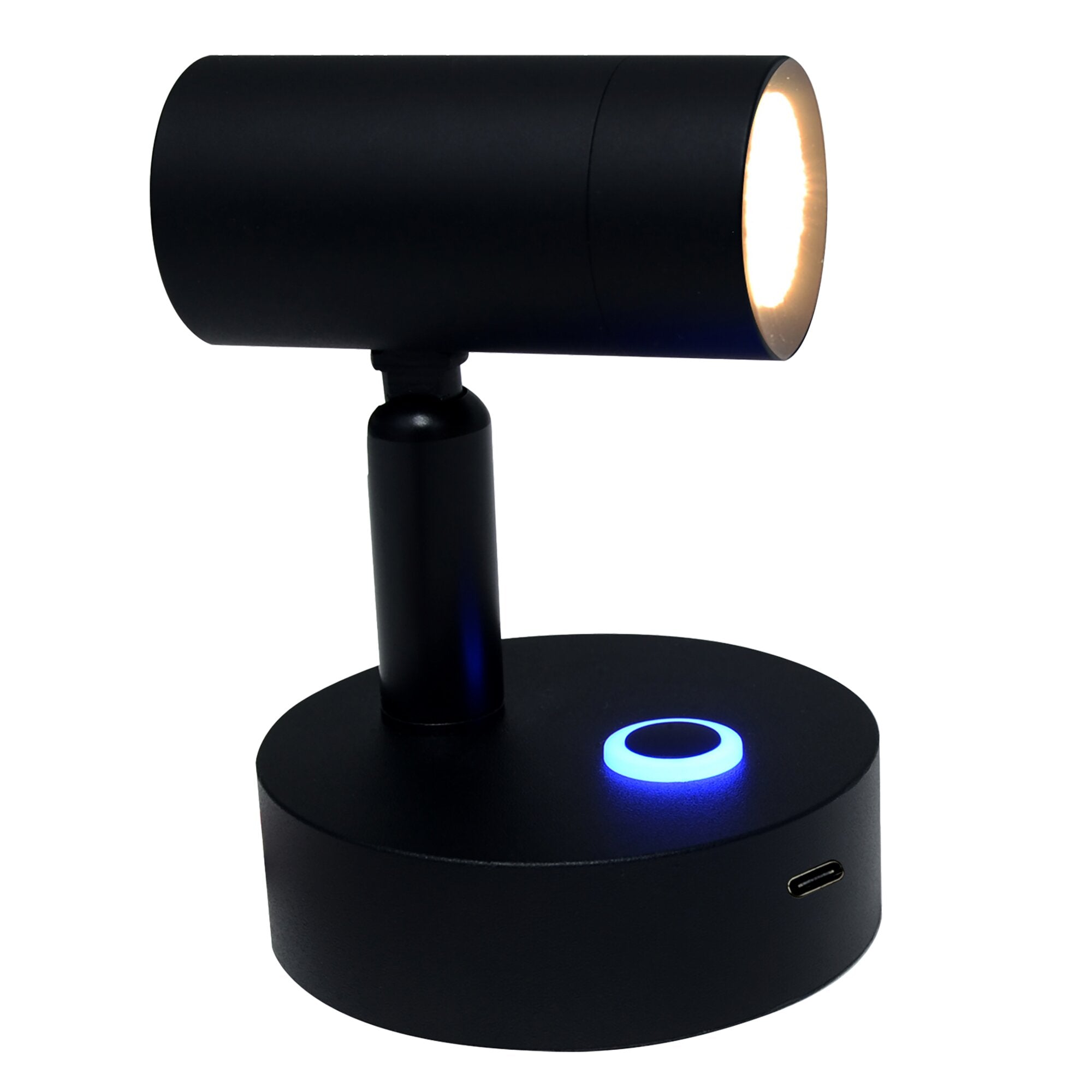 Schwarze Aufbauleuchte mit zylindrischem Kopf und runder Basis; rechte Seite leuchtet warm, Basis zeigt blauen LED-Ring und USB-C-Anschluss