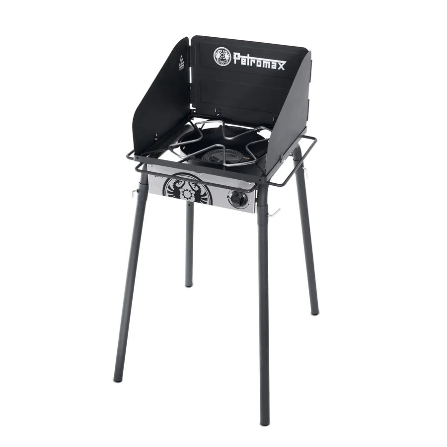 Schwarzer Petromax Gastisch mit Einzelbrenner, vier stabile Beine, Windschutz aus Metall, Grillfläche mit 37mbar.